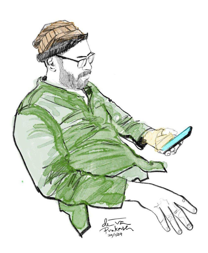 Ink and colour drawing of O.P. Suresh in a cap, looking at a phone. The sheet is dated 20/11/24.